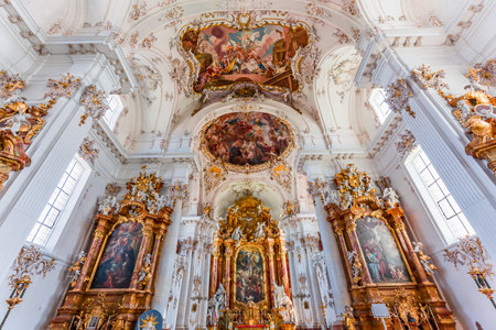 DIESSEN, BAVARIA, GERMANY, JUNE 03, 2022: Rococo and baroque decors in Diessen Marienmunster church, on Ammersee lake, by various anonymous artists , 18th centuryのeditorial素材