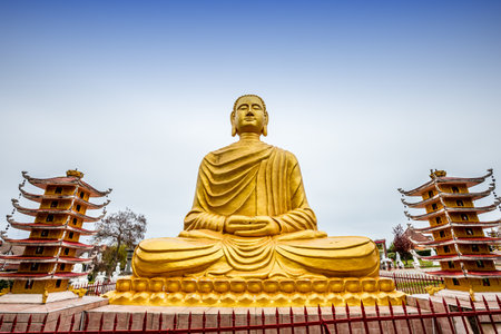 NOYANT D'ALLIER, FRANCE APRIL 11, 2023: exteriors and statues details in the garden of the vietnamese buddhist pagodaのeditorial素材