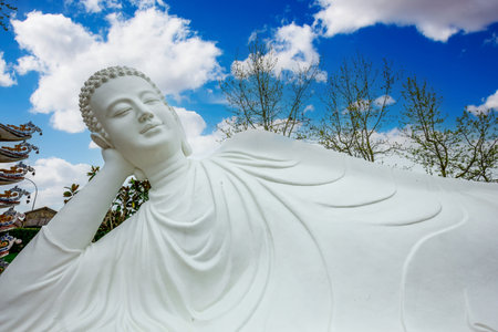 NOYANT D'ALLIER, FRANCE APRIL 11, 2023: exteriors and statues details in the garden of the vietnamese buddhist pagodaのeditorial素材