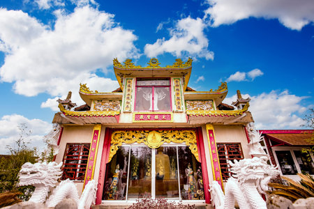 NOYANT D'ALLIER, FRANCE APRIL 11, 2023: exteriors and statues details in the garden of the vietnamese buddhist pagodaのeditorial素材