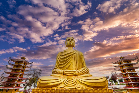 NOYANT D'ALLIER, FRANCE APRIL 11, 2023: exteriors and statues details in the garden of the vietnamese buddhist pagodaのeditorial素材