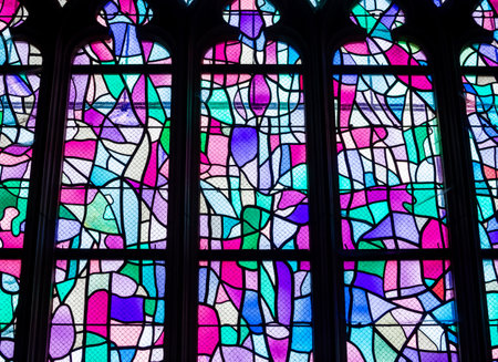 ABBEVILLE, SOMME, FRANCE, JUNE 20, 2023: details of stained glasses windows in Saint Sepulcre church, by Alfred Manessier workshop, year 1989 to 1993のeditorial素材