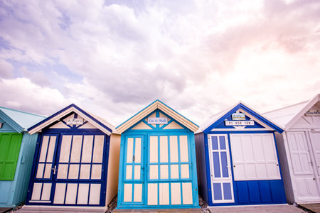 Colorful beach huts with clouds and skies in Cayeux sur mer, Somme, Normandy, Franceのeditorial素材