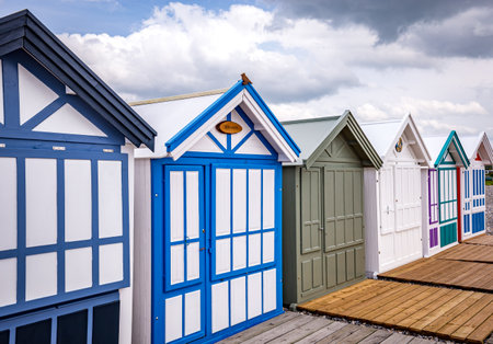 Colorful beach huts with clouds and skies in Cayeux sur mer, Somme, Normandy, Franceのeditorial素材