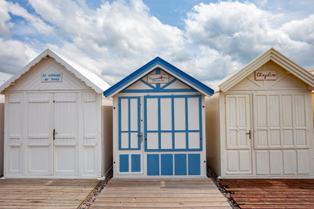 Colorful beach huts with clouds and skies in Cayeux sur mer, Somme, Normandy, Franceのeditorial素材