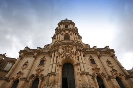 MODICA, SICILY, ITALY, JUNE 19, 2018: exteriors details and frescoes in the Duomo of san Giorgio church, june 19, 2018, in Modica, sicily, italyの写真素材