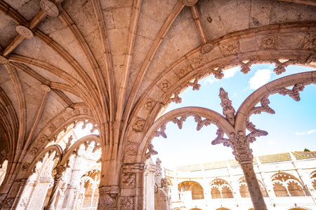 LISBON, PORTUGAL, MARCH 14, 2025, exteriors and cloister architectural details of the Jeronimos or Hieronymites monastery in parish of Belemの写真素材
