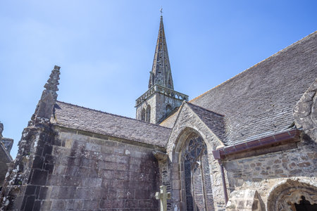 LA MARTYRE, FINISTERE, BRITTANY, FRANCE, MAY 17, 2025: exteriors and architectural details of the Parish Close church, French term is enclosure parishielの写真素材