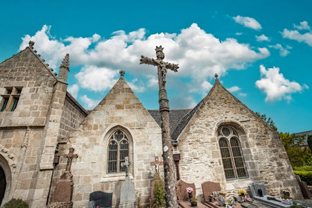 LOGUIVY, FINISTERE, BRITTANY, FRANCE, MAY 23, 2025: exteriors and architectural details of the Parish Close churchの写真素材