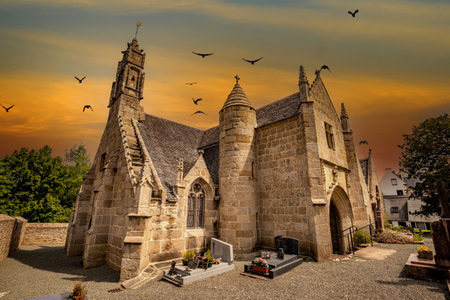 LOGUIVY, FINISTERE, BRITTANY, FRANCE, MAY 23, 2025: exteriors and architectural details of the Parish Close churchの写真素材