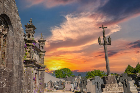COMMANA, FINISTERE, BRITTANY, FRANCE, MAY 17, 2025: exteriors and architectural details of the Parish Close church, French term is enclos paroisialの写真素材