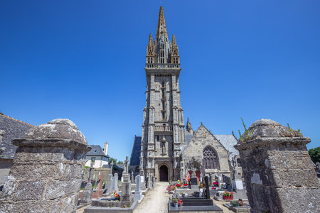 GOULVEN, FINISTERE, BRITTANY, FRANCE, JUNE 30, 2025: exteriors and architectural details of the Parish Close churchの写真素材
