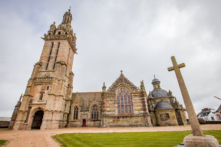 PLEYVEN, FINISTERE, BRITTANY, FRANCE, JUNE 27, 2025: exteriors and architectural details of the Parish Close churchの写真素材