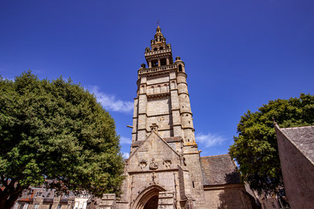 ROSCOFF, FINISTERE, BRITTANY, FRANCE, JUNE 29, 2025: exteriors and architectural details of cathedral Saint Pol Aurelienの写真素材