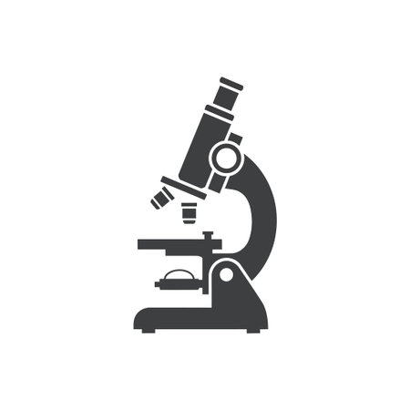 This image features a detailed illustration of a microscope, a scientific instrument used for...