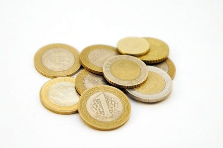 some different coins lie in one small group                               