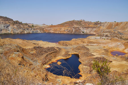 Red lagoon in abandoned mine