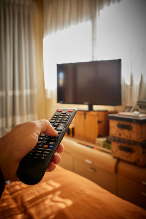 TURNING ON THE TV WITH REMOTE CONTROL