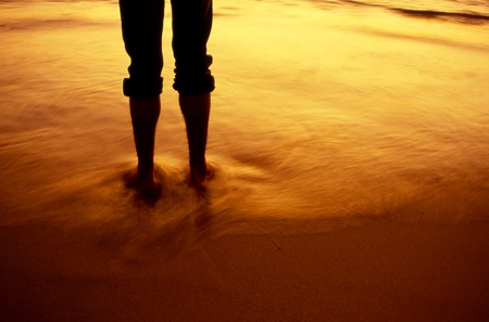 Sunset at Combate beach; Cabo Rojo; Puerto Rico showing the typical golden sand and glow...