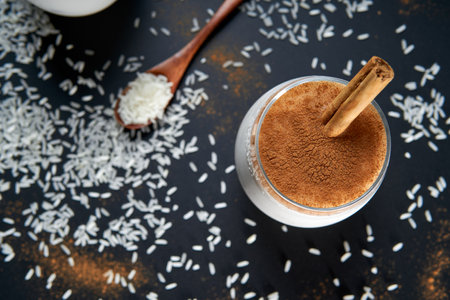 homemade Vanilla Custard with cinnamon over a white wooden table. a delicious dessert made with milk, eggs, vanilla and cinnamon. top viewの写真素材