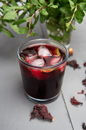 Delicious Jamaica water with dried flowers and mint also called Hibiscus tea