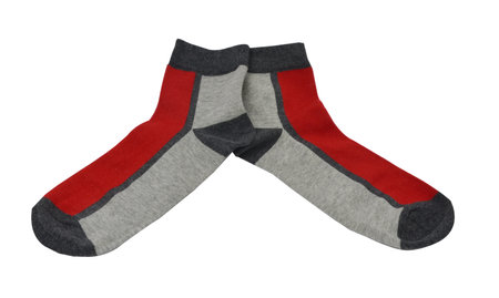 on a white background a pair of multicolored socks laid out and isolatedの写真素材