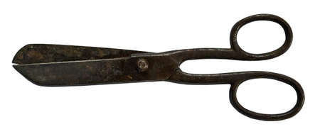 old rusty scissors lie on a white background