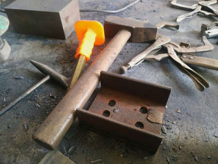 the workplace of a locksmith welder with different tools