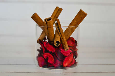 decorative elements for various festive events are placed in glass jars on a light background