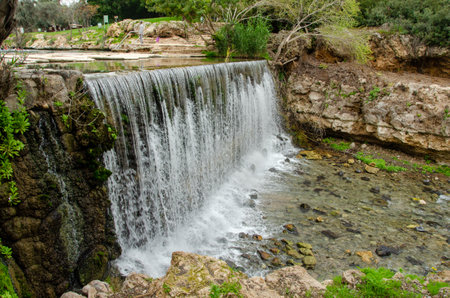 Beautiful waterfall in Gan Haslosha National Park in Israelの写真素材