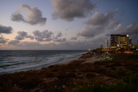 Netanya, Israel - September 23, 2021: hotels near the sea on Sderot Oved Ben Ami street eveningのeditorial素材