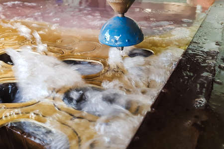 CNC water jet cutting machine is a modern industrial technology for cutting any material