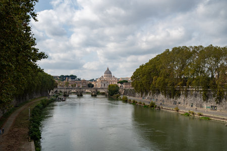 Rome, Italy - October 23, 2022: Rome, Italy - October 22, 2022: Rome, Italy. Papal Basilica Of St. Peter In The Vatican. Sightseeing Boat Floating Near Aelian Bridge.のeditorial素材