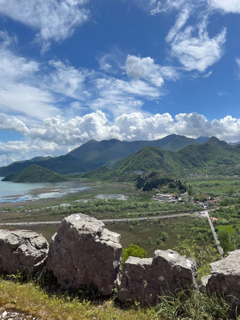 Montenegro Skadar Lake beautiful scenic coast national park panorama. Blue sky water reflection sunny outdoor Mediterranean summer wonderland background. European tourism vacation concept. High quality photoの写真素材
