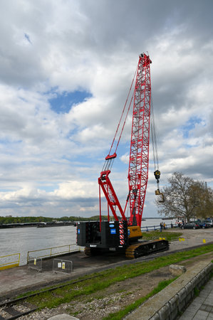 Serbia, Smederevo April 19, 2023: Cargo crane on the Danube River. High quality photoのeditorial素材