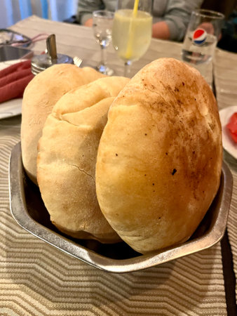 A loaf of traditional Serbian homemade bread - fresh pogaca baked in open fire oven. High quality photoの写真素材