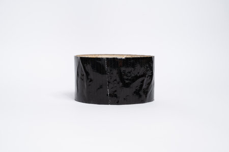 Black electrical tape isolated on white background. High quality photoの写真素材