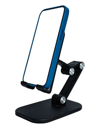The smartphone stands on a stand on a white background with a white cut-out screen.の写真素材