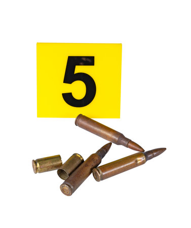 yellow evidence marker with number next to which are cartridges and shells. transparent background. High quality photoの写真素材
