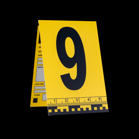 Marker of Crime Scene, Number 9 on a black background. High quality photoの写真素材