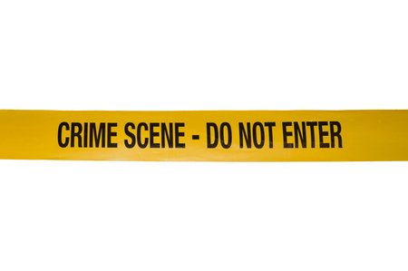 Yellow Crime Scene Do Not Cross Tape Isolated on a white background. High quality photoの写真素材