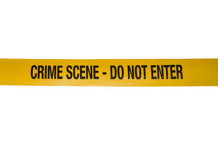 Yellow Crime Scene Do Not Cross Tape Isolated on a white background. High quality photoの写真素材