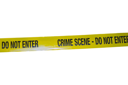 Yellow Crime Scene Do Not Cross Tape Isolated on a white background. High quality photoの写真素材