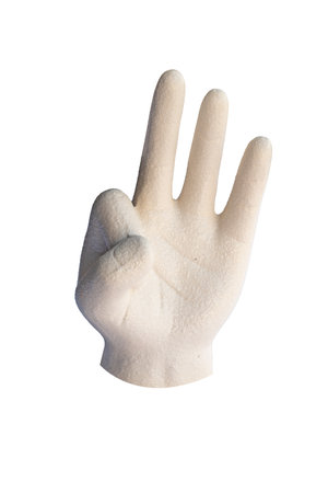 Sculpture of a hand making OK gesture, ceramic or plaster art piece on square base, symbol of approval and positivity. High quality photoの写真素材