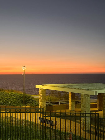 Sunset on the promenade in Netanya, Israel, overlooking the gazebo. High quality photoの写真素材