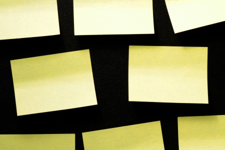 group sticky notes on black background without writingの写真素材