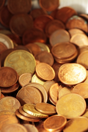 euro coins scene expressing the problems of economic crisis and the need to saveの写真素材