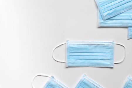 blue face masks on white background