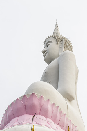 White statue of Buddha at Ubolratana Damの写真素材