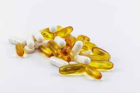 Macro pills over white backgroundの写真素材